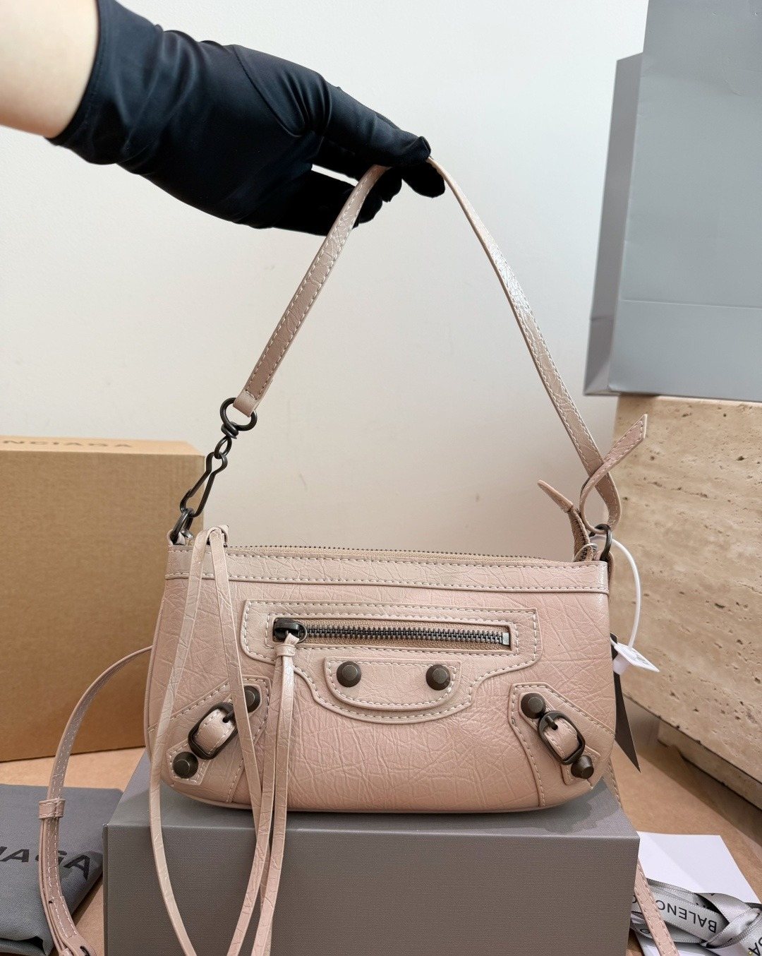 Balenciaga Studded Shoulder Bag with Long Zipper Ties — model