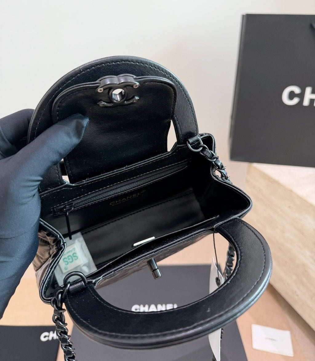 Chanel Kelly Quilted Top-Handle Bag — detail