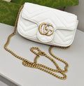 Gucci Chevron-Quilted Mini Chain-Strap Flap Bag — hero